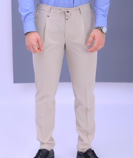 Стилен бежов панталон с баста и италиански джоб от крепон